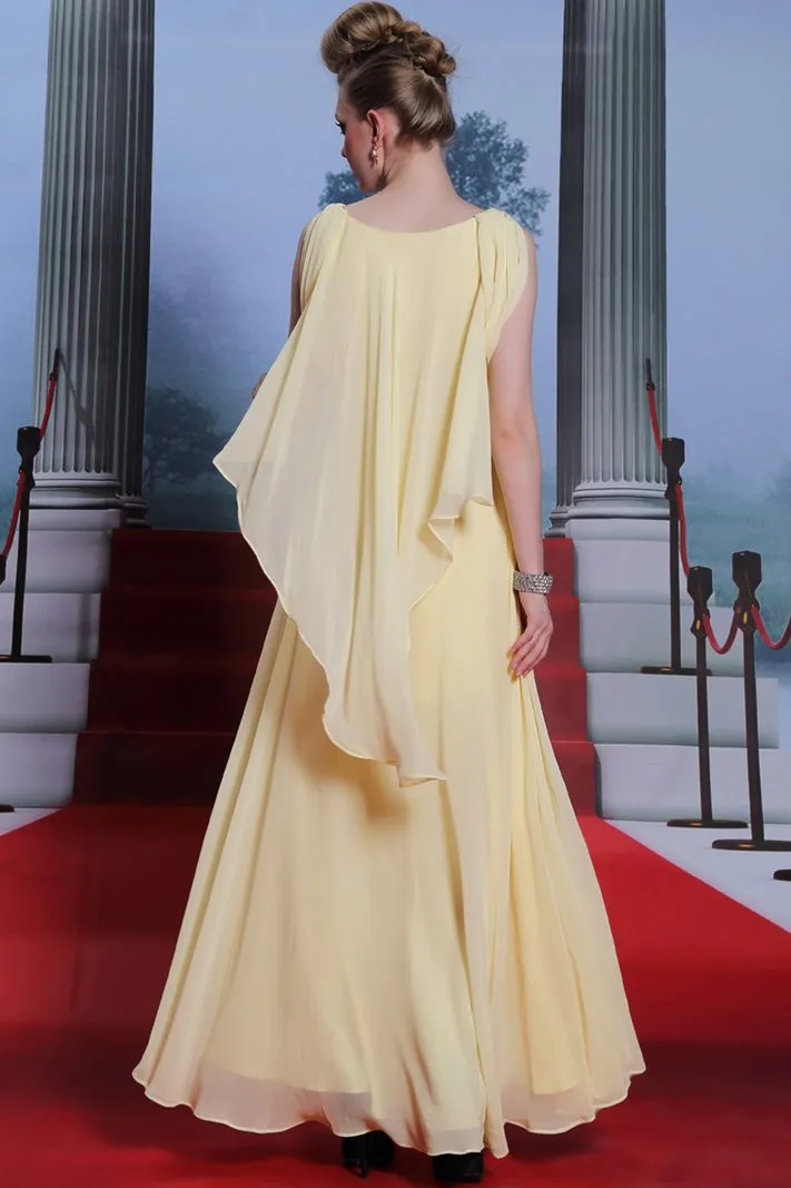 ---Yellow dress for grand gala made of soft chiffon with incorporated cape and many bright decorations--